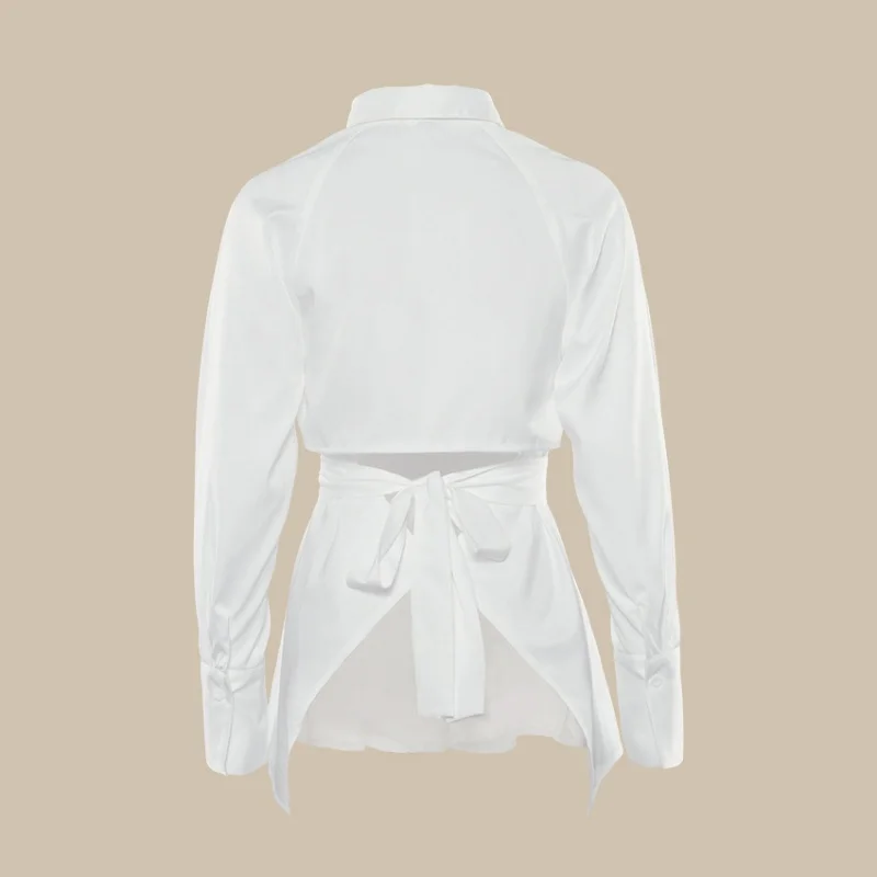 Europa e America Leaky Ba Hollow Bandage irt Top Colore puro Lungo Sve Slim Fit irt Sve con cintura Bal Design
