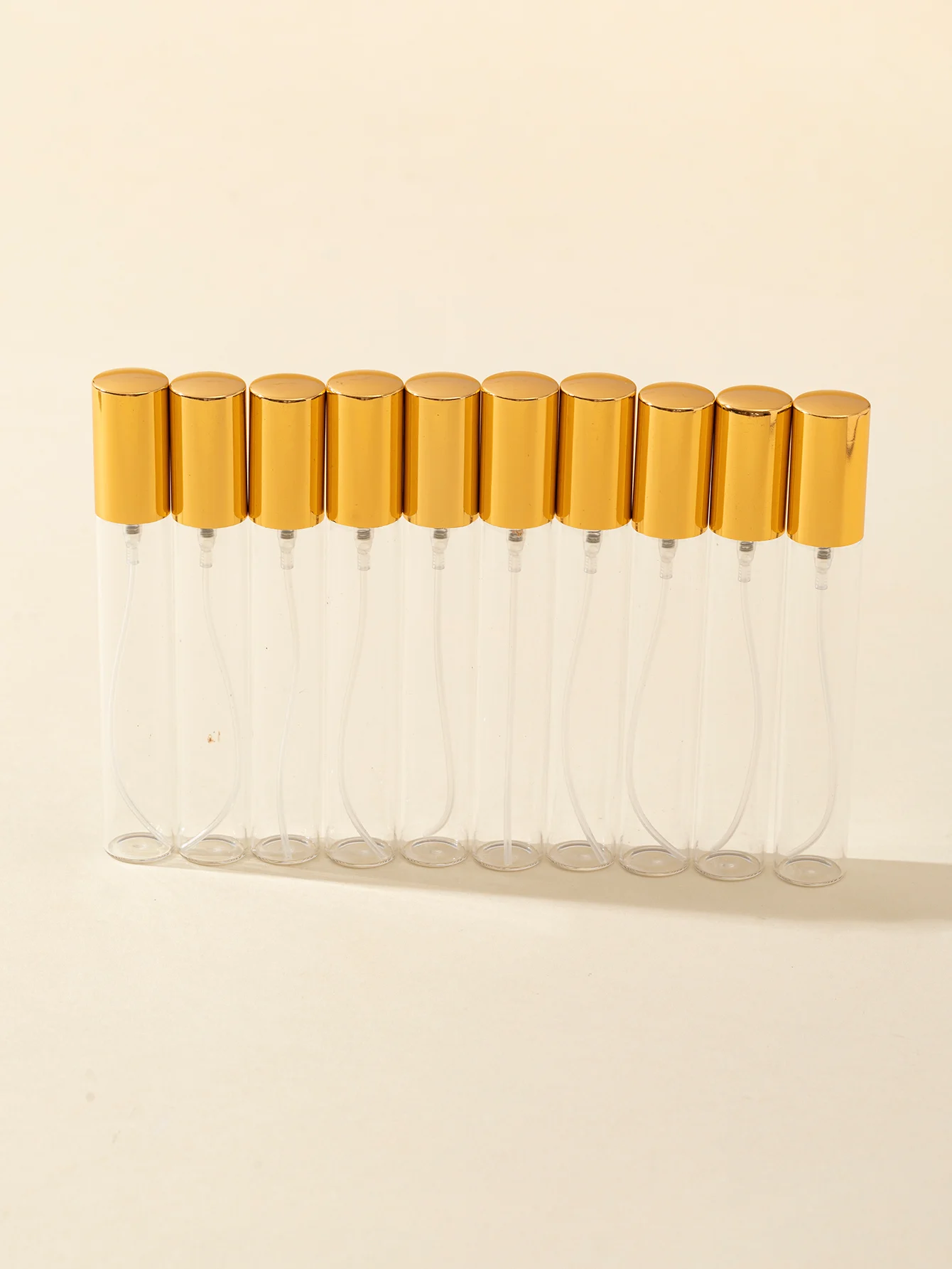 Groothandel 35/stuk 5ml10ml15ml lokale tiran goud transparant glas verdikte spuitfles mini parfumflesje reisformaat