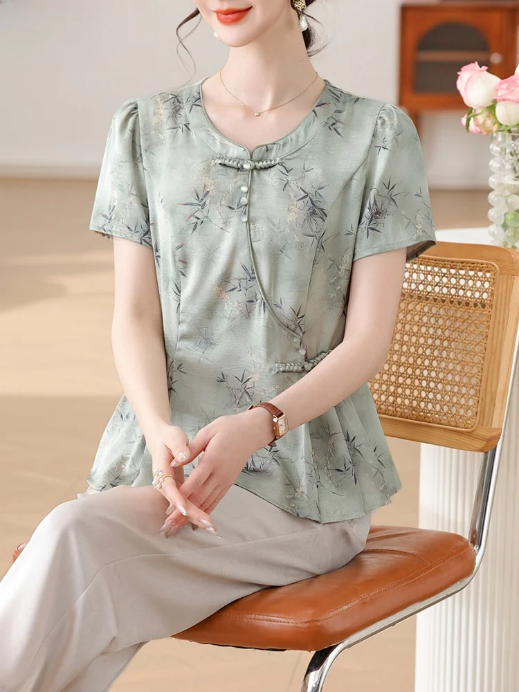 

Новый китайский летний комплект одежды 2025 года: модный национальный тренд для женщин среднего возраста, топ и брюки.