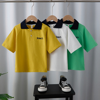 Vibrant Kids' Short - Sleeve Polo Shirts: Yellow, White and Green Styles with Dark Blue Collars and \