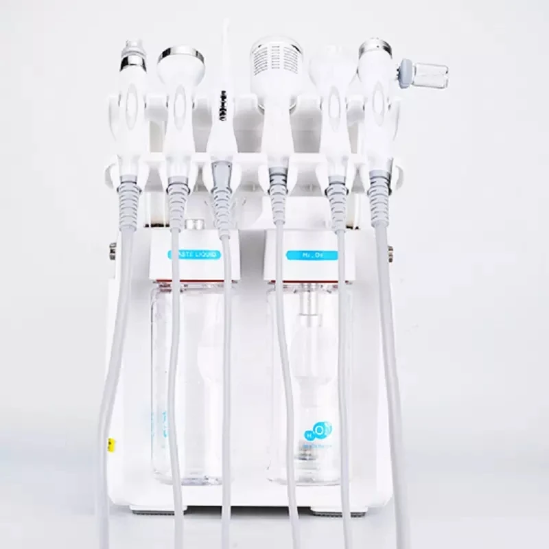 

Многофункциональный аппарат 7-в-1 для кислородно-водной дермабразии и очищения кожи H2O2: гидропилинг и аквапилинг для лица