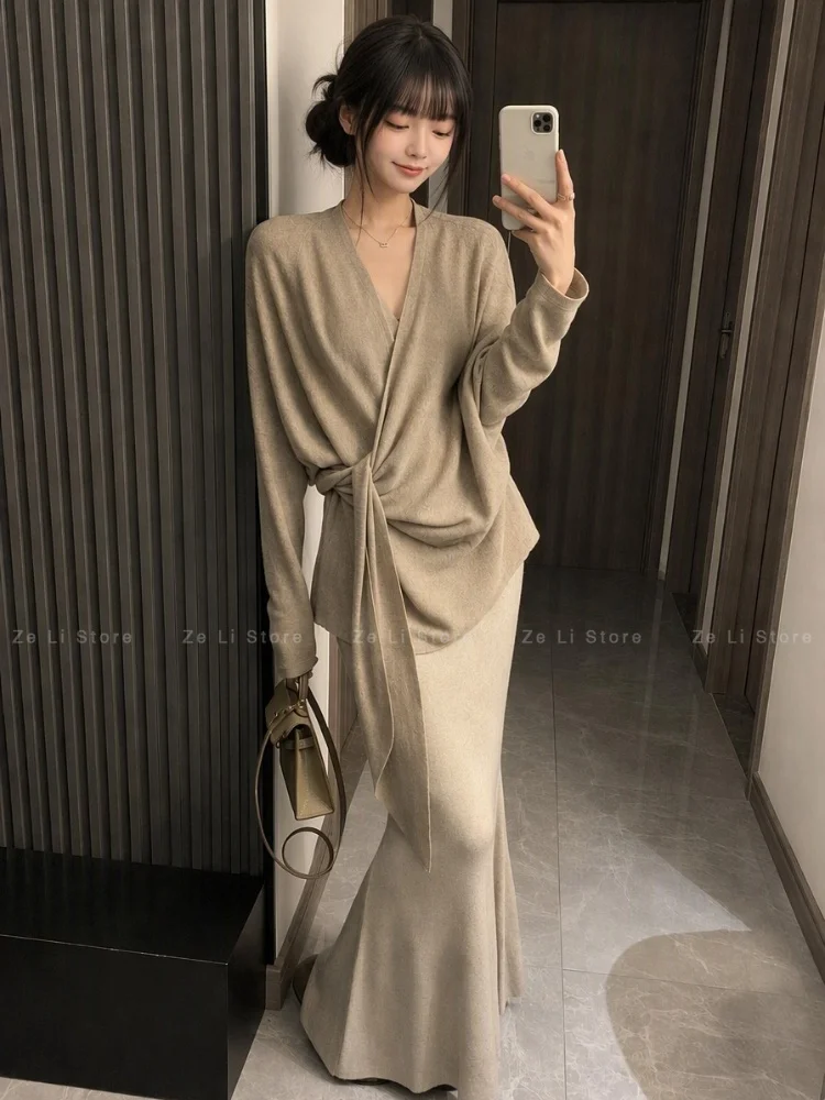 Design Sense Two Wear V-neck Knitted Sweater Women's Spring and Autumn Cross Strap Waist Top Fishtail Skirt Two-piece Set