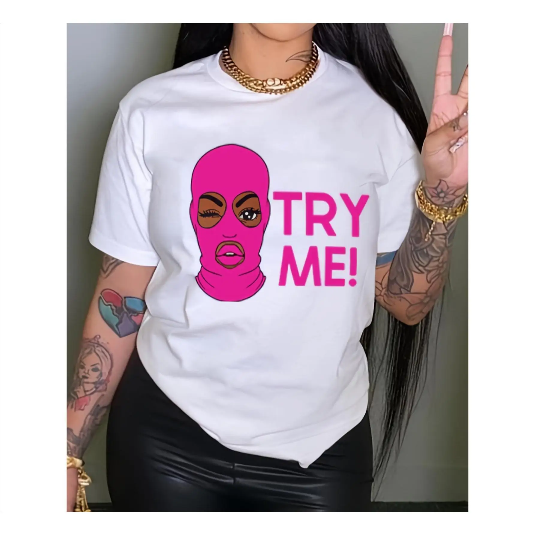 

Fashion - forward Bold Tee: Embody a Feisty and Trendy Vibe with the "TRY ME!" Graphic