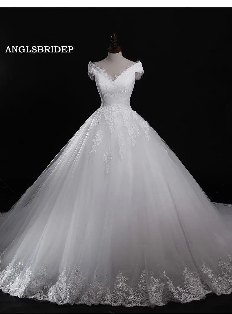 Abiti da sposa con scollo a V Tulle incrociato Appliques di pizzo di lusso Vestidos de Novia lunghezza del pavimento corsetto indietro abito da ballo formale Plus Size