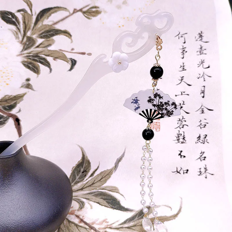 

Заколка с кисточкой в форме веера в стиле ретро, аксессуар для волос в древнем стиле, современная и простая спиральная заколка для женщин