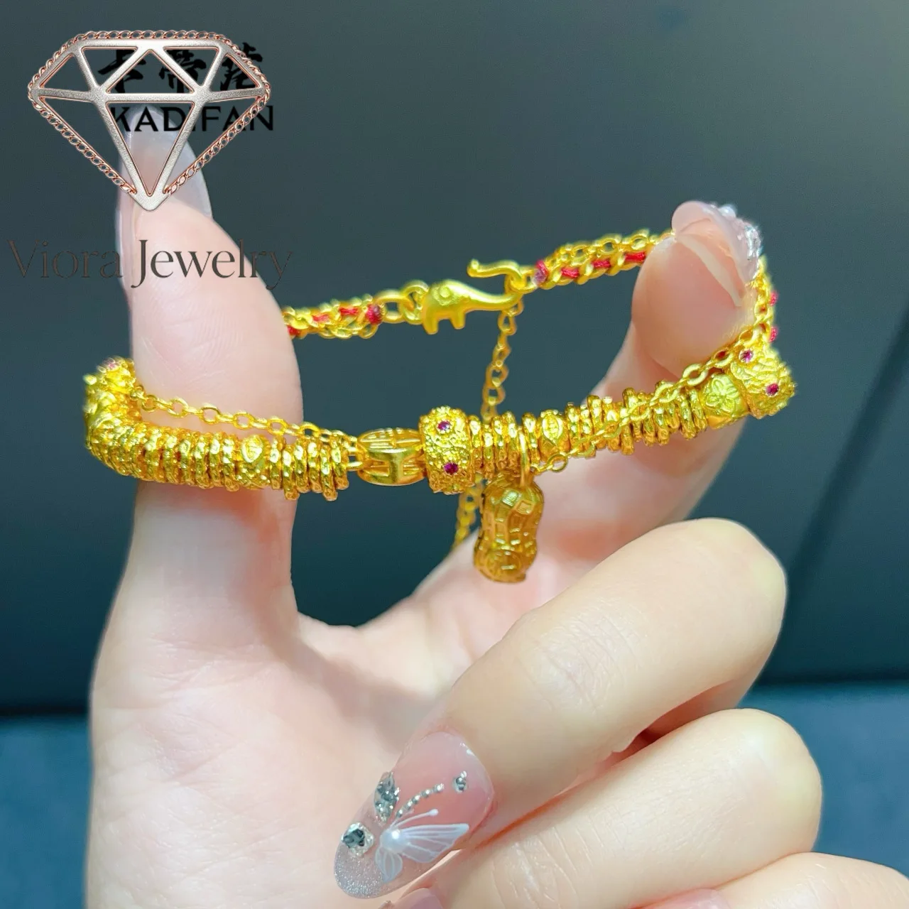 

Viora Jewelry Luxury Jewelry 9999 24K real gold Fuzi peanut dish bracelet high-end design Chinese style red bracelet