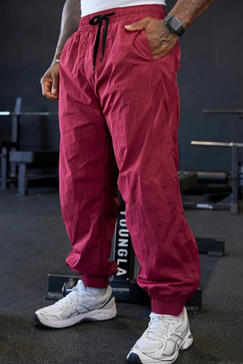 

Spring and autumn men's outdoor sports lightweight stretch pure-color training pants, fashionable sports loose-cuffed long pants