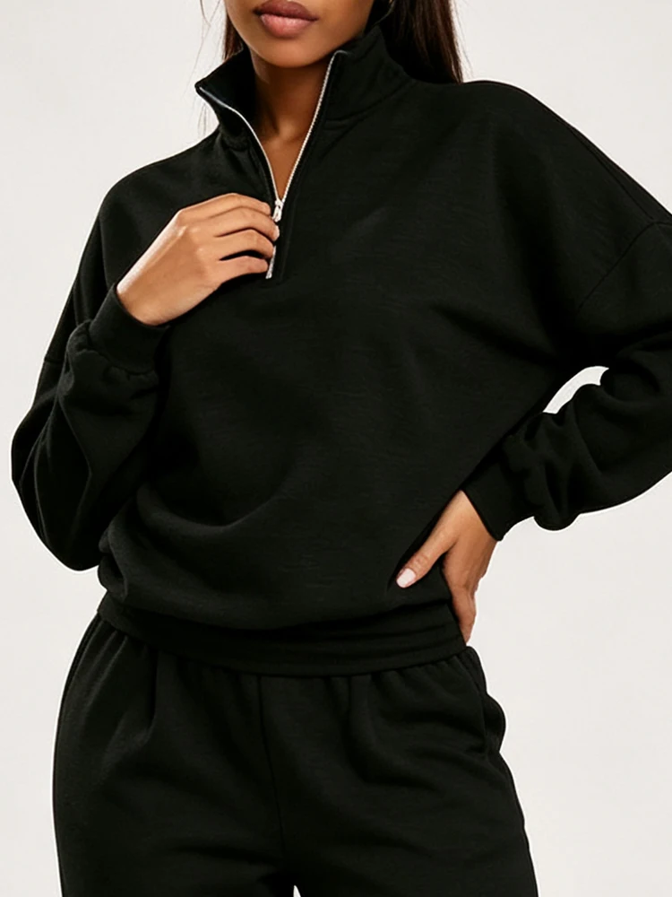 American-style trendy loose long-sleeve pullover with a stand collar for women, featuring a fold-over collar design and a front center zipper closure, suitable for everyday casual wear and social gatherings.