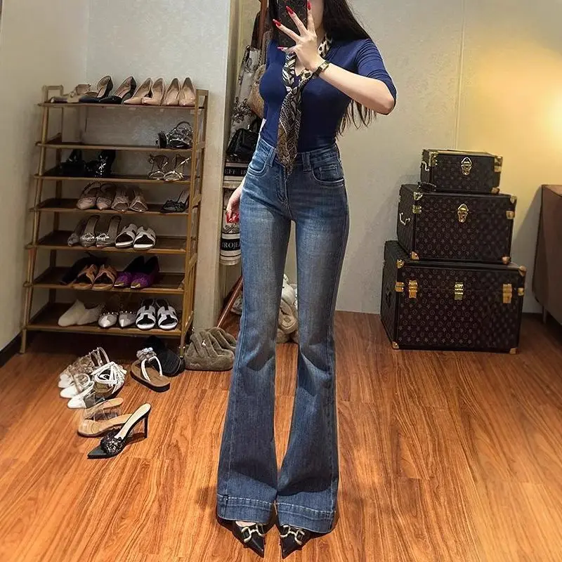 2025 Otoño Invierno pantalones vaqueros acampanados oscuros para mujer con forro polar cintura alta ajuste ajustado levantamiento de glúteos alargamiento de piernas