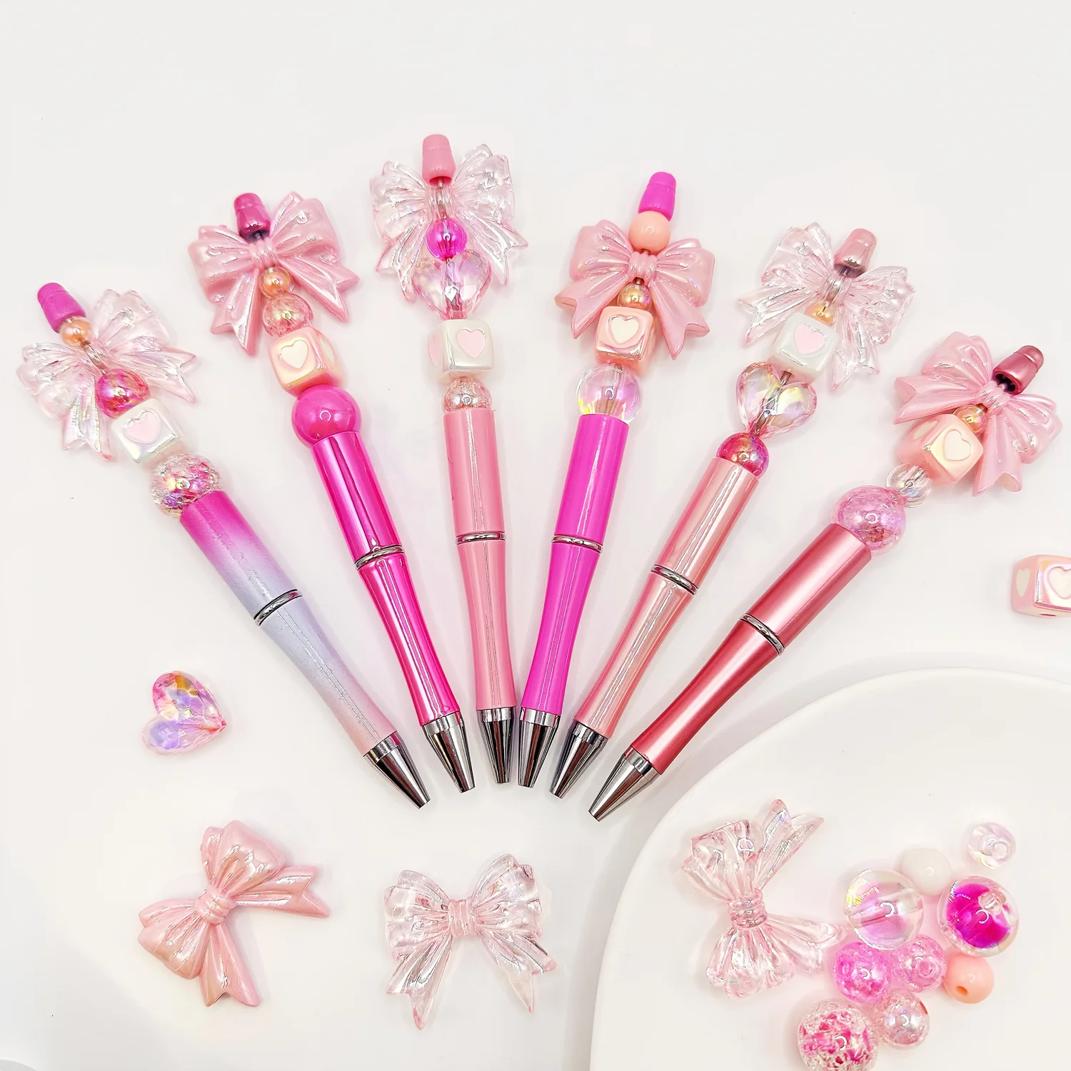 

6Pcs Pink Rotating Gradient Acrylic Bowknot Theme DIY Beaded Pen Set Office Stationery