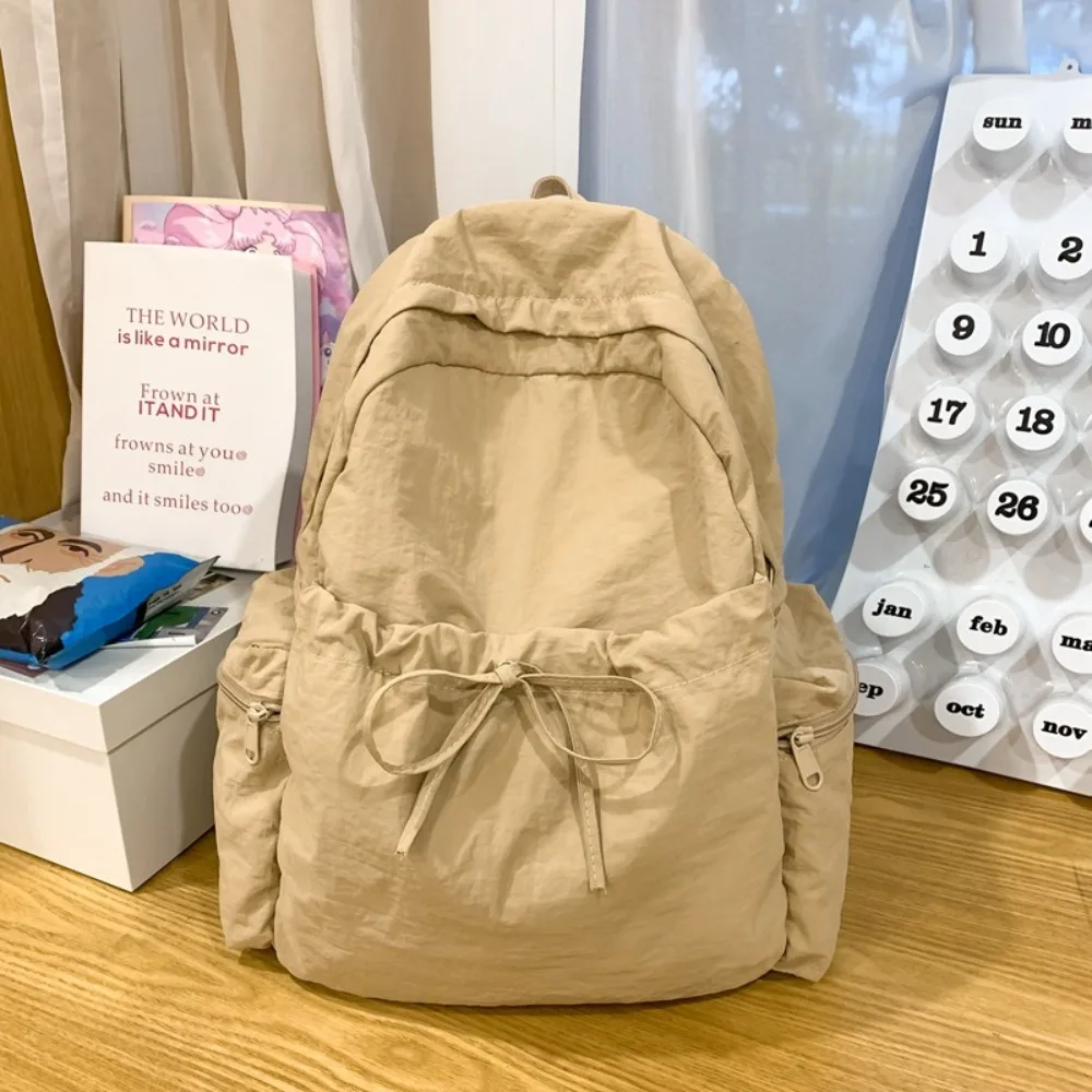 

New Design Bow Wrinkle Backpack Sweet Solid Color Nylon Lightweight Backpack Korean Style School Bag Travel Shoulders Bag Girls