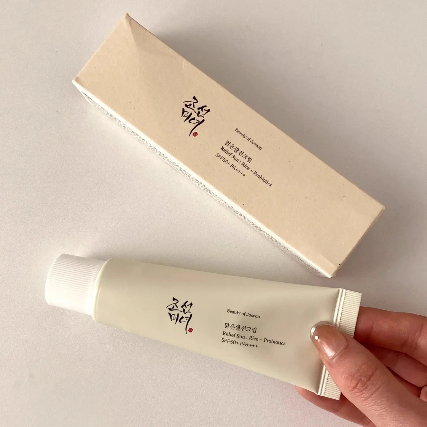 Protetor solar facial com FPS 50+ e proteção anti-UV, 50 ml, da marca Beauty of Joseon, para uso no corpo e no rosto. Creme protetor solar com probióticos de arroz.