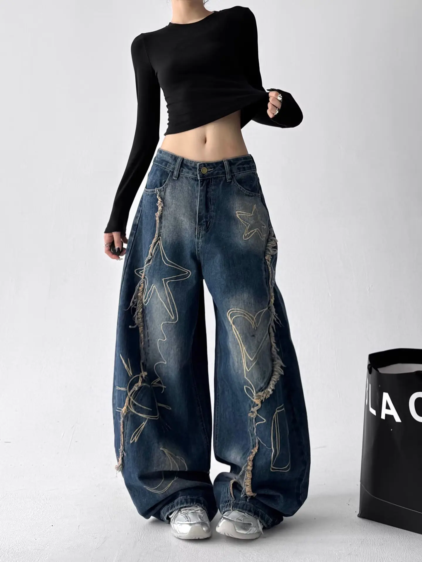 กางเกงยีนส์ทรงหลวมสไตล์อเมริกันฮิปฮอปปักลายอินเทรนด์และใช้งานได้หลากหลายสำหรับผู้หญิง กางเกงขากว้างสไตล์สตรีท Y2K สำหรับทุกเพศ