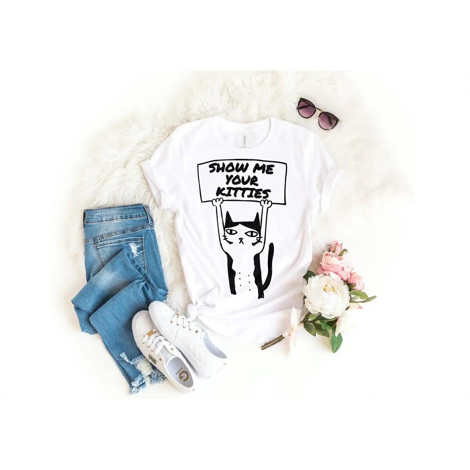 May include White t shirt with a black and illustration of cat holding sign that says Show me your kitties vintage Washed