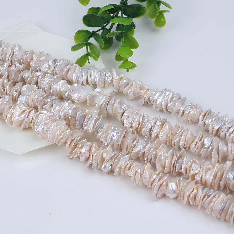 

Wholesale 15-16mm natural white color freshwater keshi pearls beads strand stacked holes drilled for women jewelry making