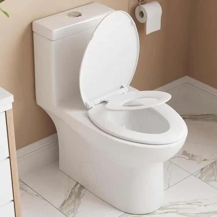 Elongated One Piece Toilet, Standard Toilet for Bathroom with Potty Training Seat, Power Flush 1.1/1.6 GPF Toilet