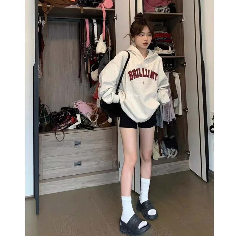 Suéter de lana para mujer, abrigo Retro americano con capucha, pequeño, holgado, coreano, viento perezoso, novedad de Otoño de 2025