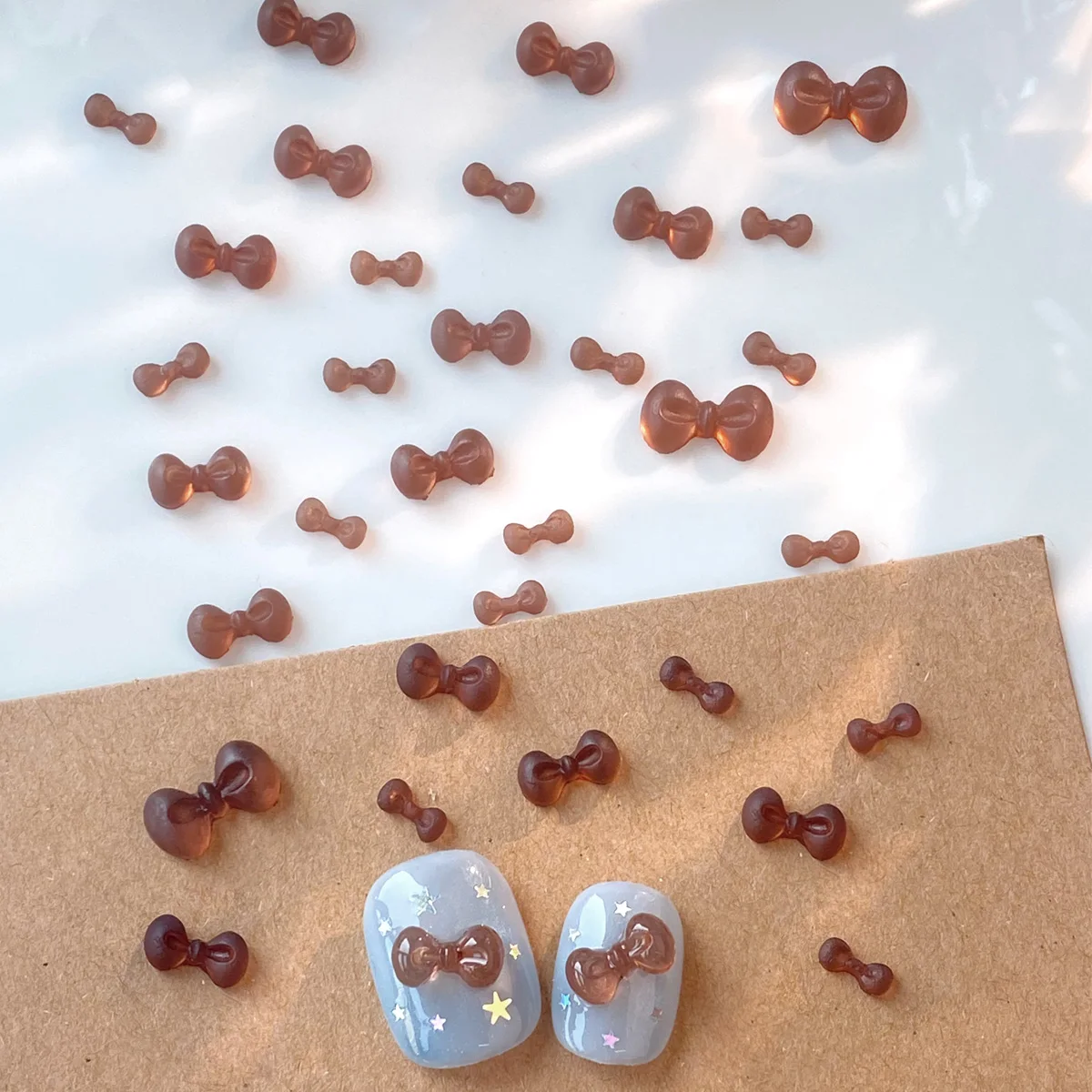 100 pièces mélange taille marron nœud papillon INS Nail Art breloques 3D Mini marron nœud papillon Style coréen accessoires pour ongles bricolage ongles