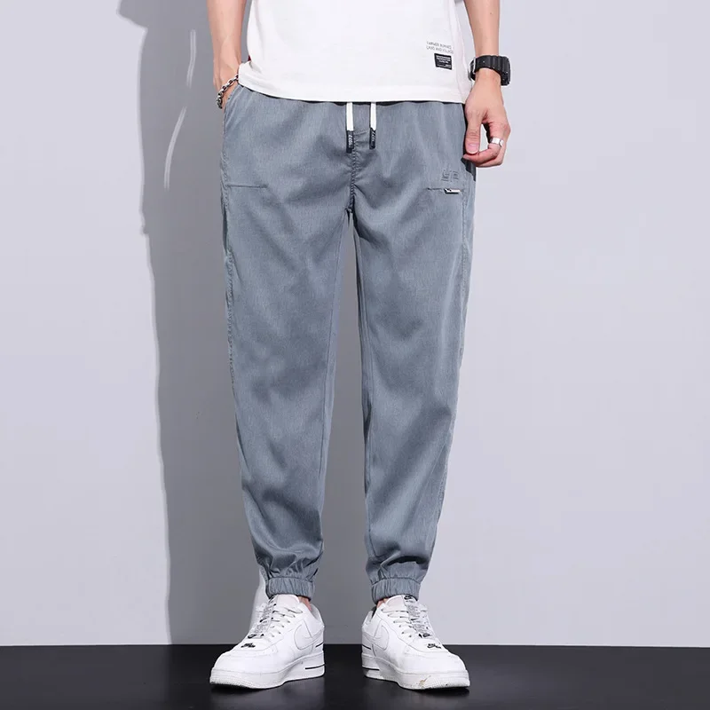 

Korean Fashion joggers Men Trendy Loose and Quick Drying 9-point Lyocell Casual Pants New Slim Baggy Pants