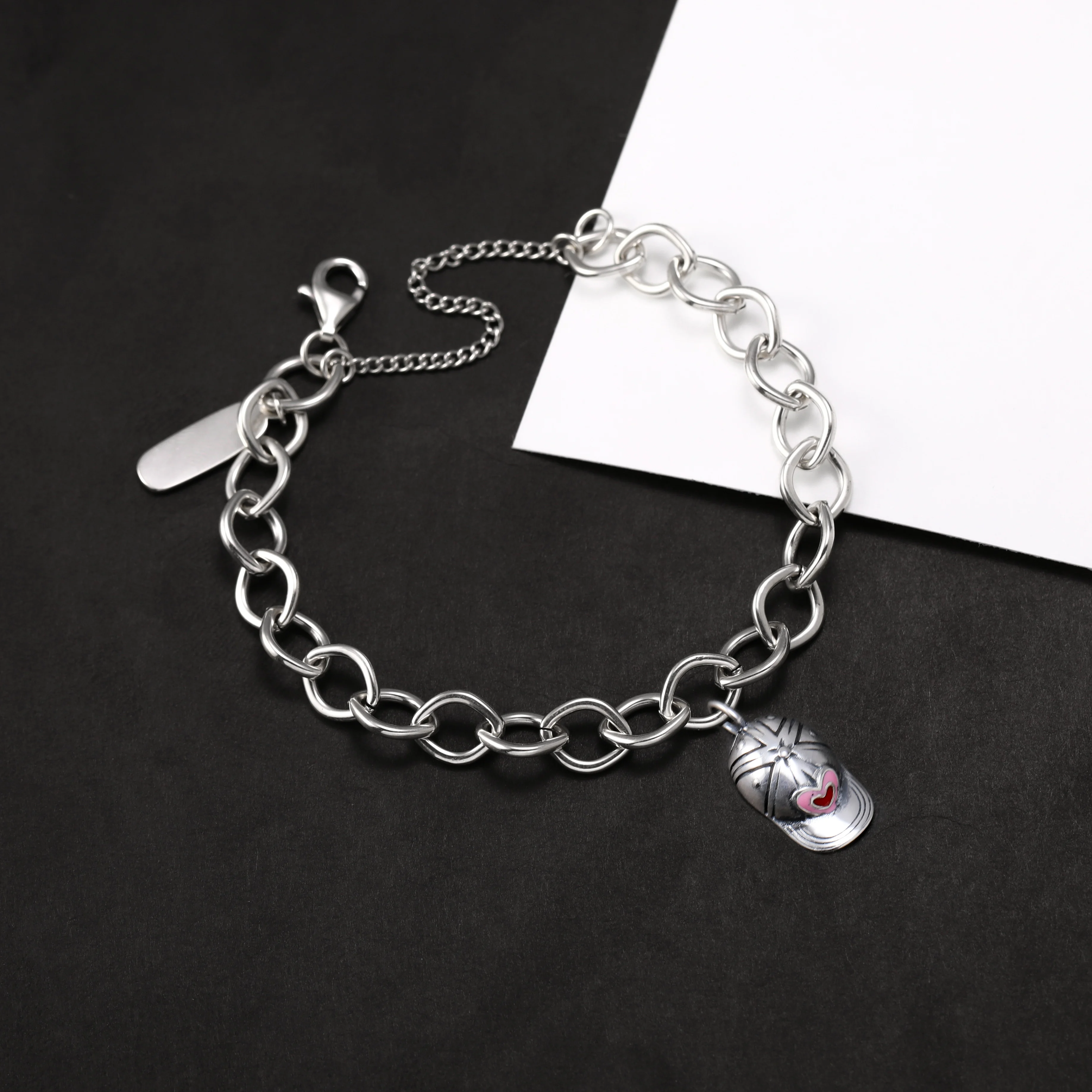 

Genuine 925 sterling silver Forged Link Charm Bracelet paired with an enamel heart-shaped ball cap pendant