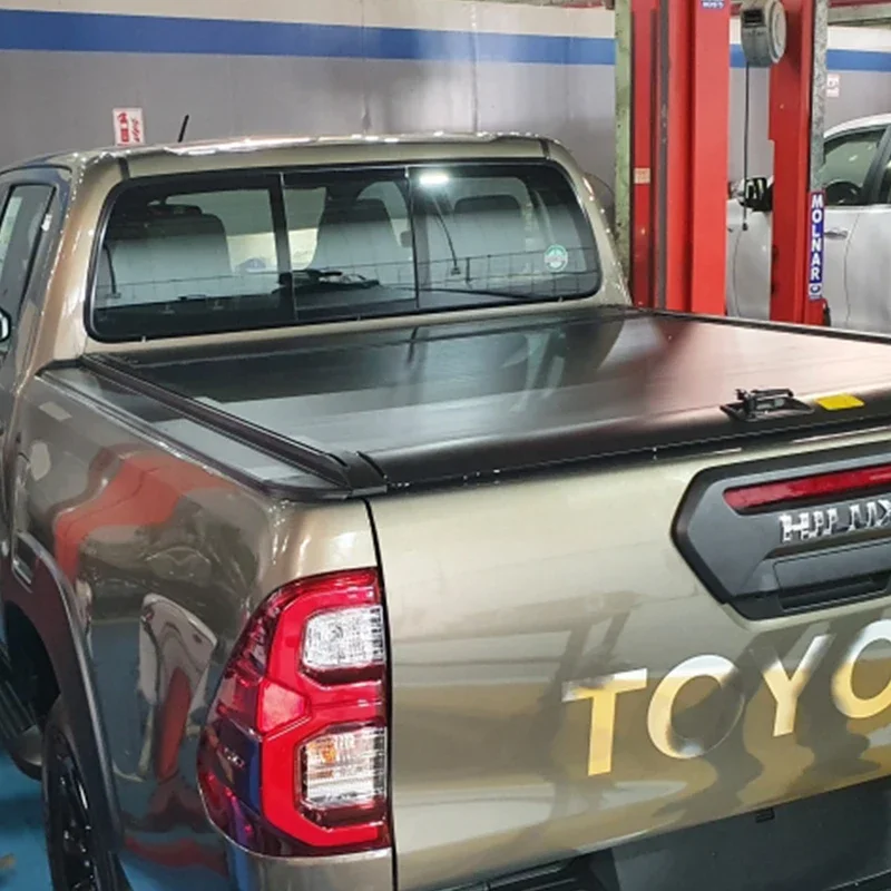 Chinese manufacture retractable tonneau cover pickup truck bed covers roller lid for Hilux