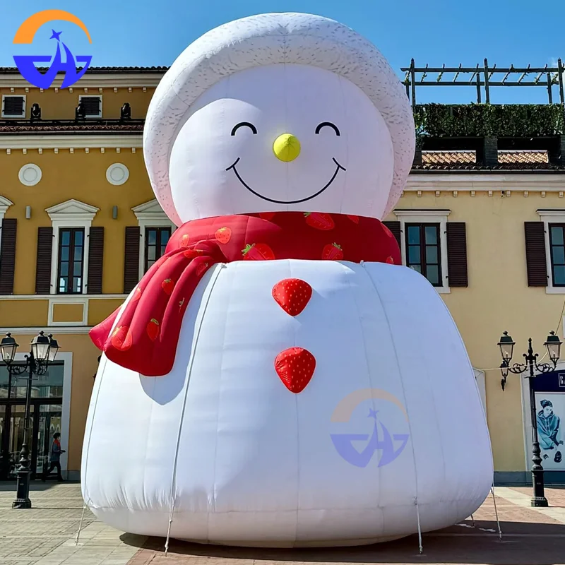 نموذج رجل الثلج الكرتوني القابل للنفخ مع قبعة حمراء ووشاح عيد الميلاد والشتاء في الهواء الطلق ديكورات للباحة