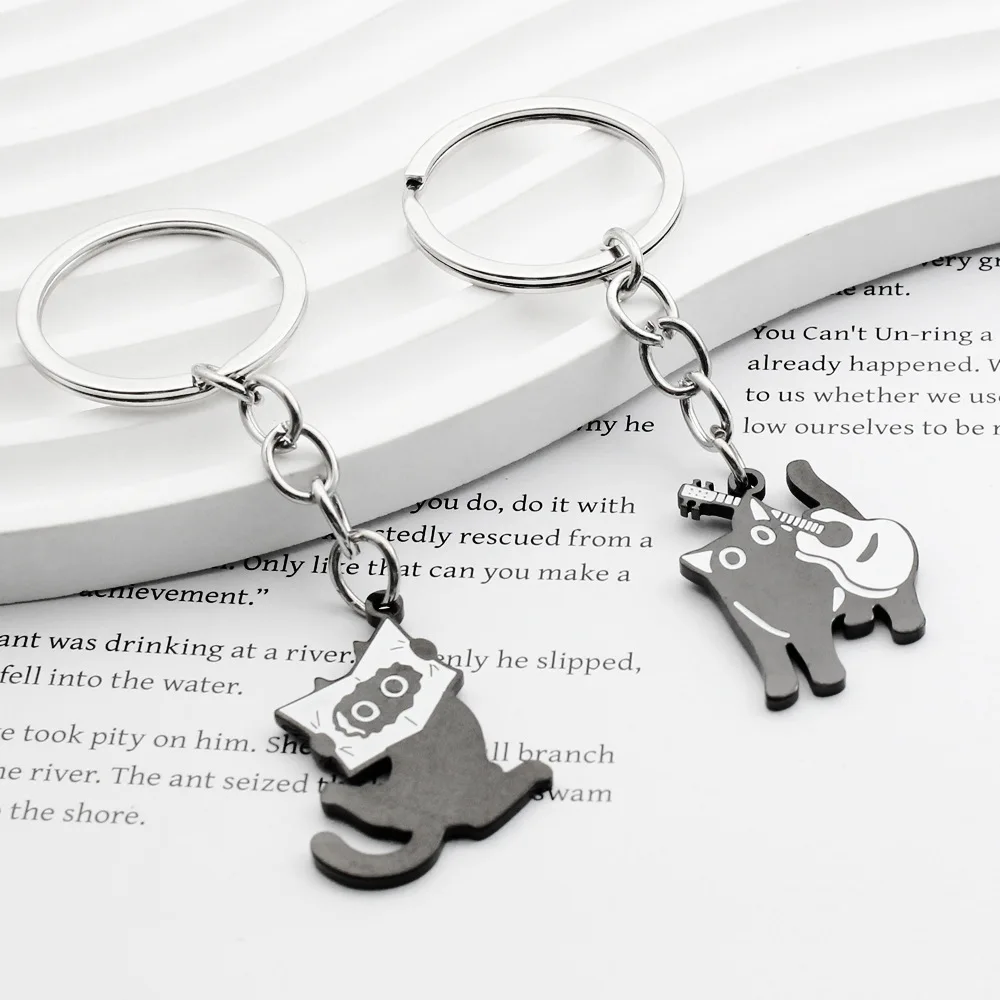 Милый-брелок-кошечка-с-гитарой-забавный-мультяшный-брелок-из-нержавеющей-стали-подвеска-капля-масла-в-виде-читающего-черного-кота-украшение-для-сумки-креативный-подарок