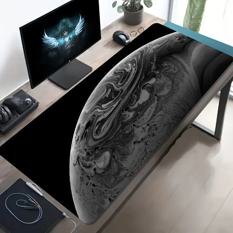 Mousepad is designed with marble, featuring an anti-slip rubber and a washable It has an extended and is suitable for office use