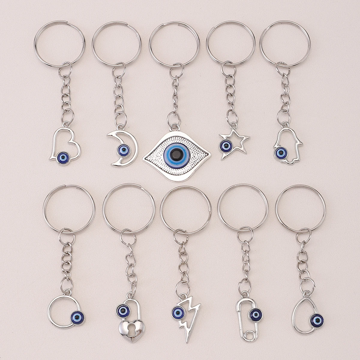 

10pcs Silver Metal Evil Eye Keyring Amulet Good Luck Keychain Purse Bag Backpack Accessory Charm Birthday Party Favors