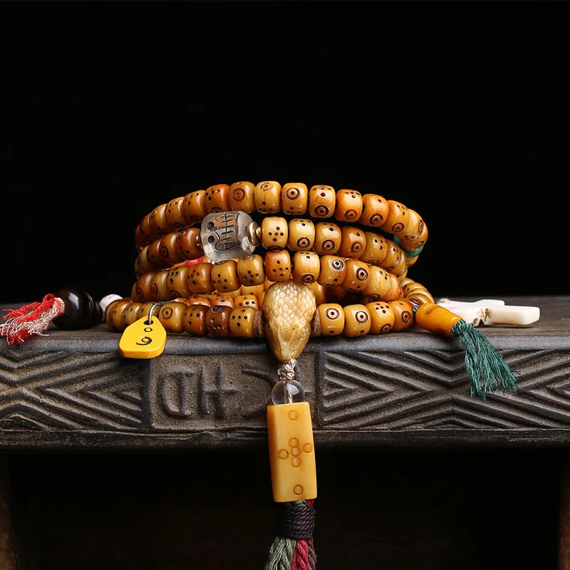 Tibetan-style backflow yak bone bead bracelet with carved mantra symbols,108 beads, prayer beads,hand-worn, tassel, buffalo horn
