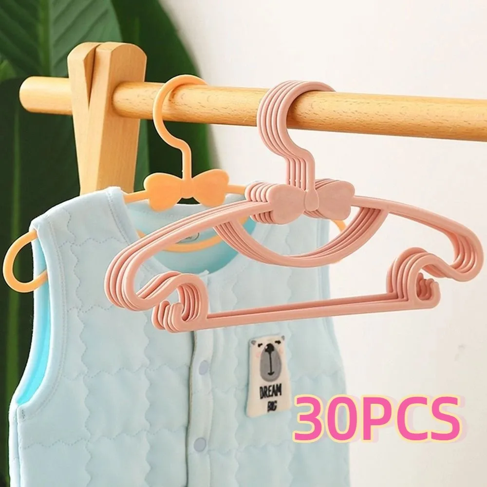 

30Pcs Plastic Material Baby Clothes Racks Cute Bowknot Windproof Kids Clothing Hangers Durable 2 Side Hooks Closet Organizer