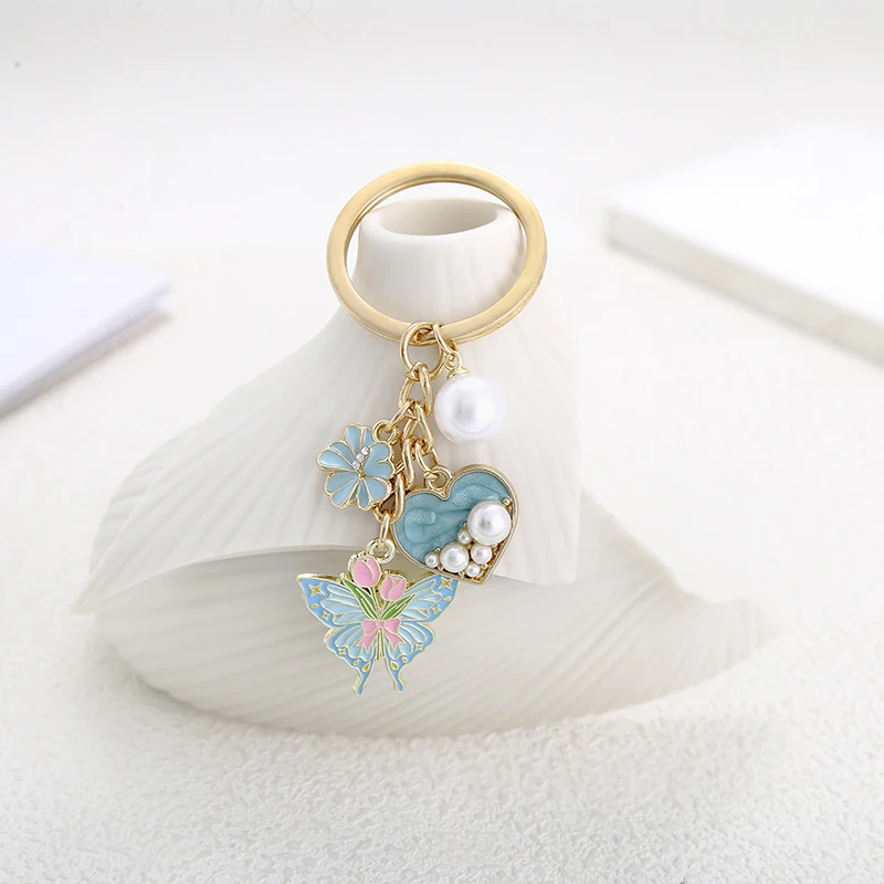 Oil-dropping Lake Blue Butterfly Flower Love Pendant High-grade Keychain Pendant Buckle Small Ornaments