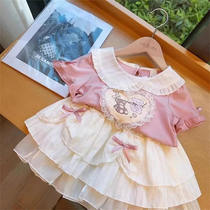 

ZLYM-Summer New Girls' Puff Short Sleeve Doll Collar Cartoon HeartTTrendy Cake Top and Skirt Set