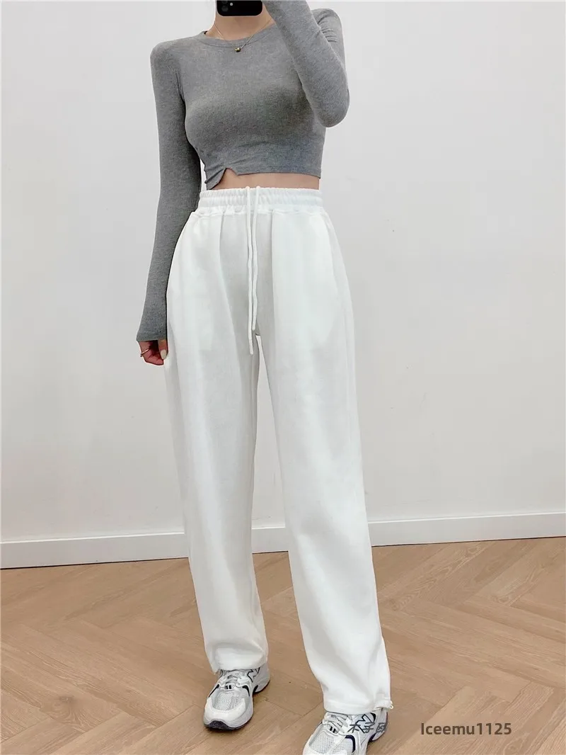 กางเกงขายาวเอวสูงทรงหลวมสบายสไตล์ลำลอง ขาบาน ปลายขาจั๊ม ผ้ามีความยืดหยุ่น แฟชั่นสตรีท ไซส์พลัส