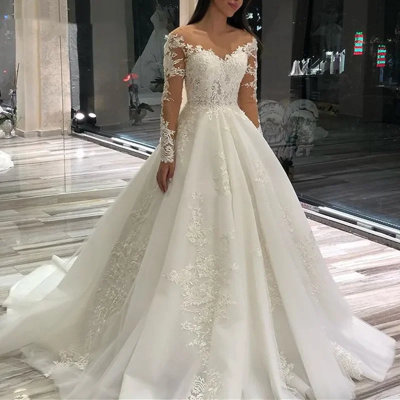 Elegancka koronkowa suknia ślubna Suknia ślubna Seksowna suknia ślubna bez pleców z długim rękawem V-Neck Koronkowe aplikacje Tren Plisy Robe De Mariée