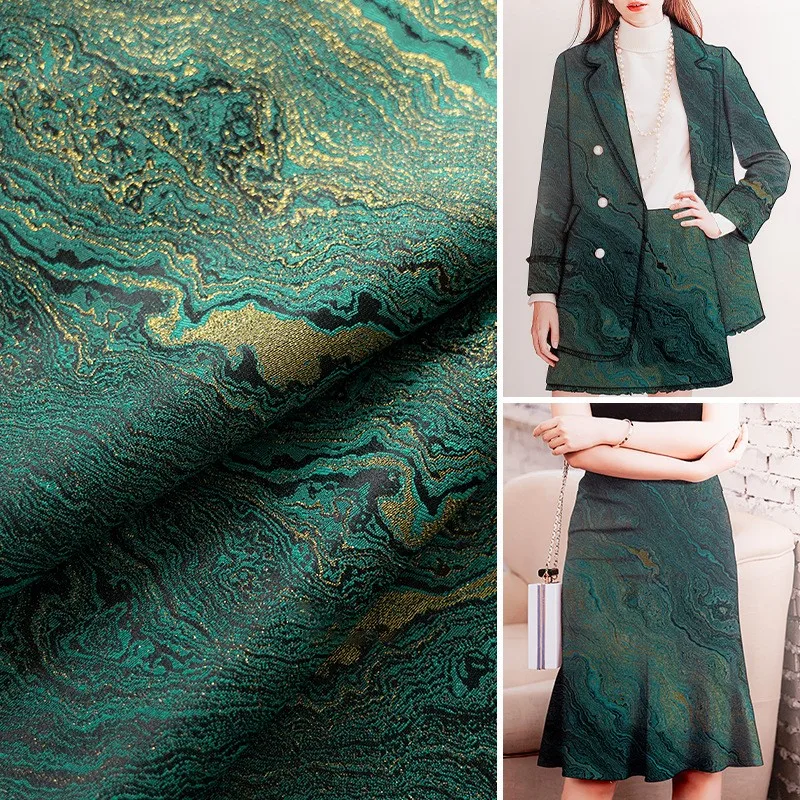 The designer's fabric for dark green landform jacquard with and gilded cheongsam outer suit skirt pants