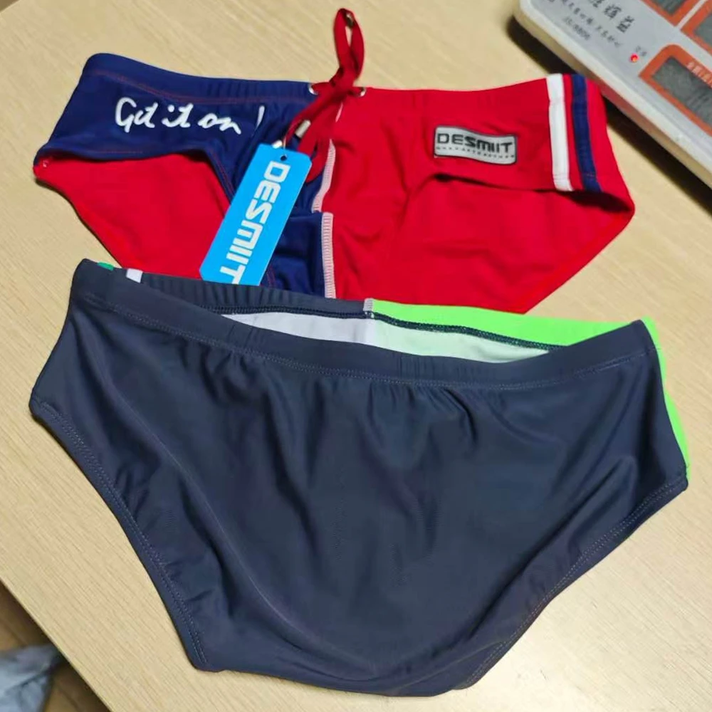 2026Wholesale supply, real shot men's briefs, low waist, color matching tethered beach swimming trunks DMS01