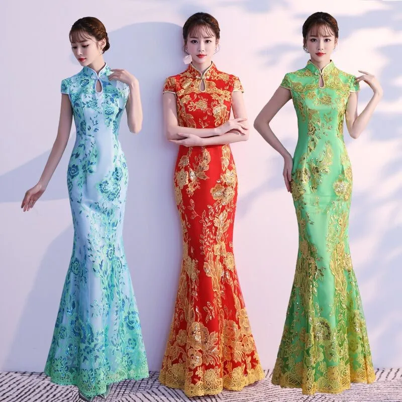 

A long form-fitting Chinese-style ceremonial dress with fish-tail modified cheongsam for women