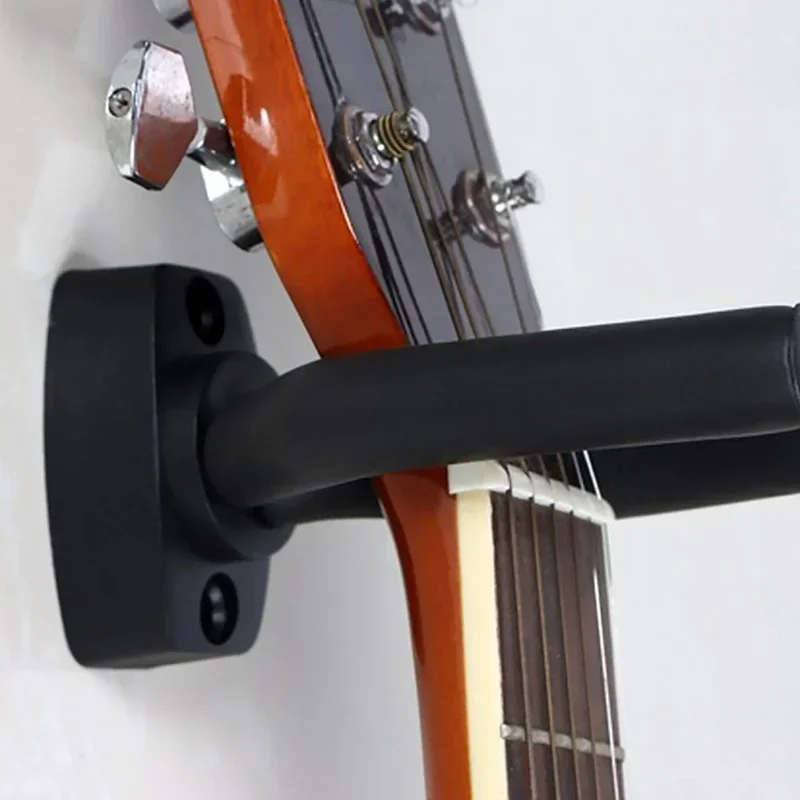 An der Wand montierte Gitarrenaufhänger-Haken sind für Gitarre, elektrischen Ständer, Musikinstrumenten, Zubehör, Instrumente, Sport geeignet