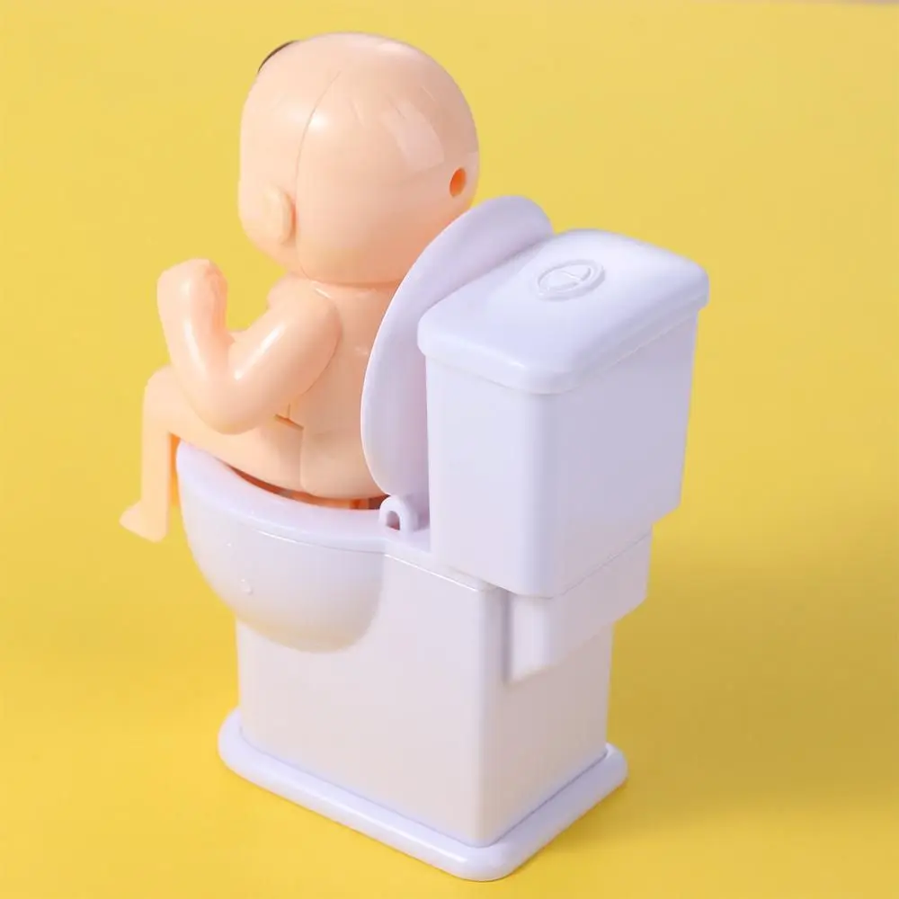 Interesting Tricky Toys Funny Spray Prank Humanoid Doll Squirt Joke Toy Mini Sprinkler Toilet Water Spray Toy Toilet Pee Boy