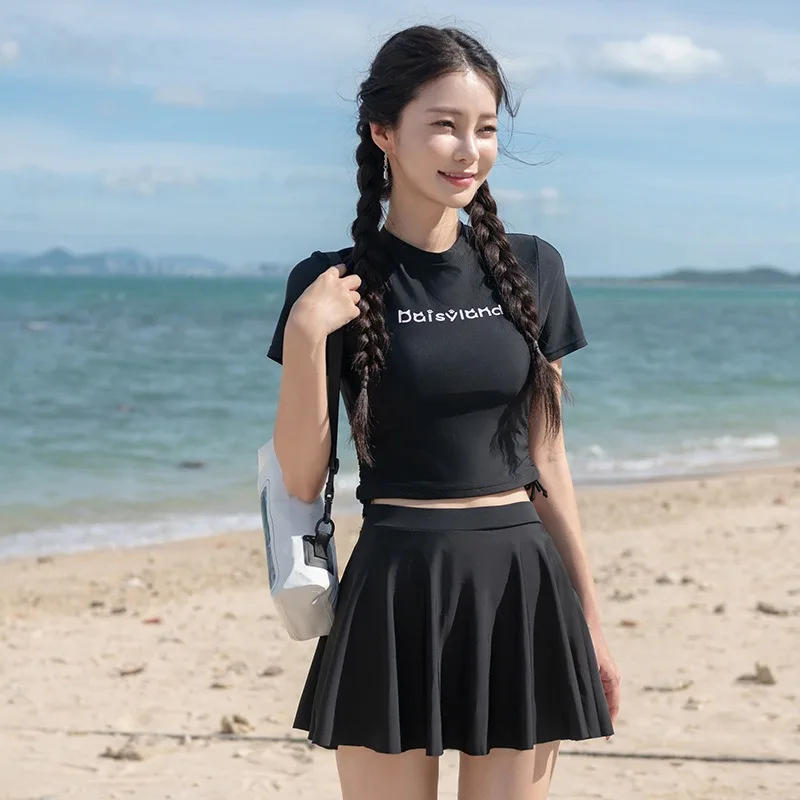 Women's 2-Piece Crop Top Rash Guard Swimsuit with Skirted Bottom, Short Sleeve Swimwear Set for Beach Vacation and Swimming Pool