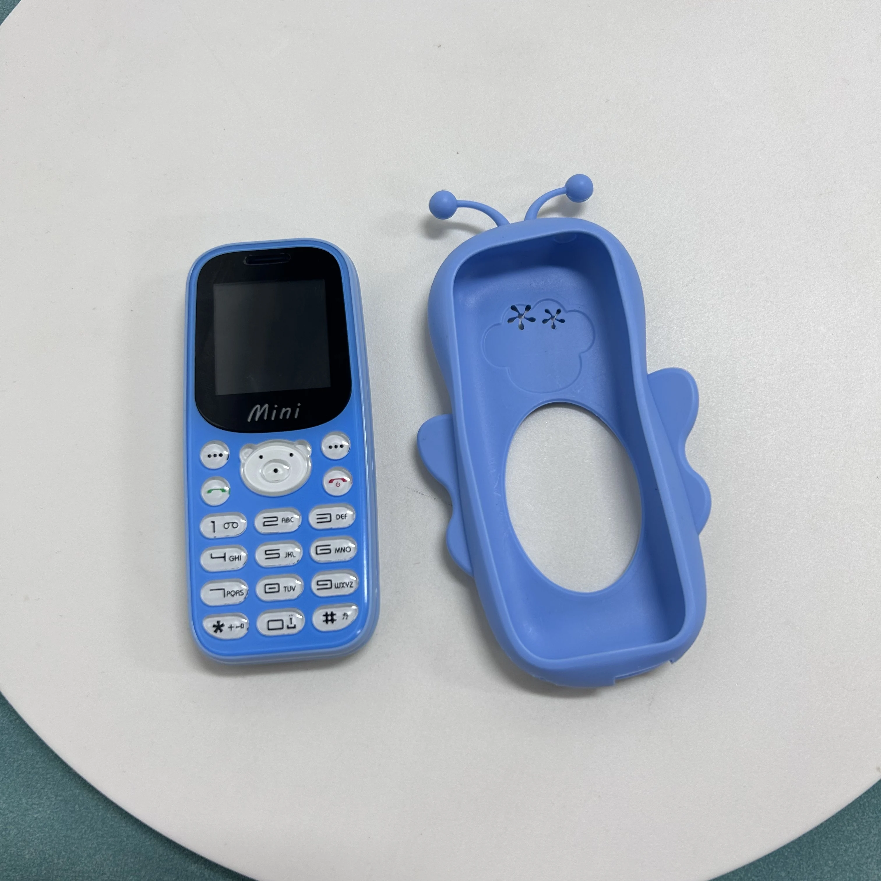 جديد H21 هاتف محمول صغير لطيف على شكل رسوم كرتونية شاشة 1.44 بوصة MTK GSM 2G ميزة شعلة هاتف راديو FM هاتف طالب رخيص #5