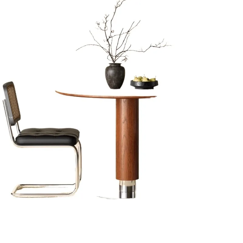 

Simple solid wood dining table, household small apartment medieval travertine rock slab table and chair combination