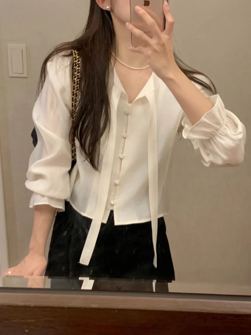 تصميم كوري للنساء ort Sve irt ربيع 2025 جديد Sweet Ele Faionable Bell Sve Top Commute Sle Pure E-commerce