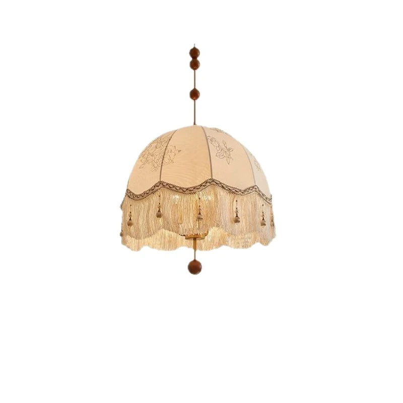 

French medieval restaurant chandelier log cream wind Nanyang fringed cloth flower-shaped art study light luxury bedroom