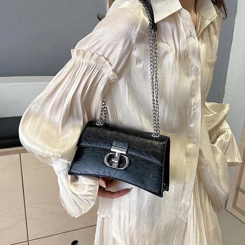 Single Shoulder Bag 2024 New High Aesthetic Women's Light Luxury Fashion Chain Crossbody Simple and Versatile Saddle Bag