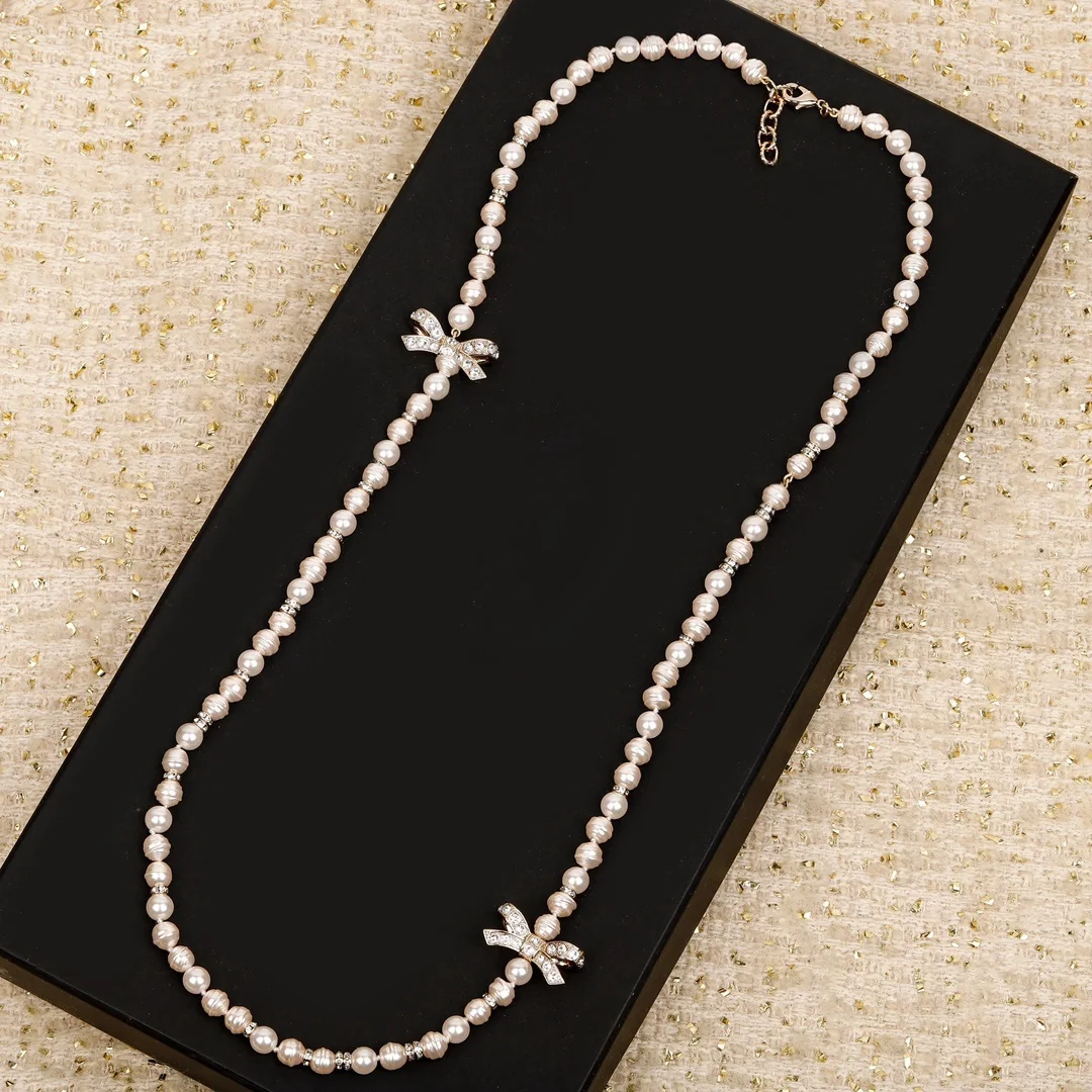 

Elegant high quality bow full rhinestone pearl sweater chain