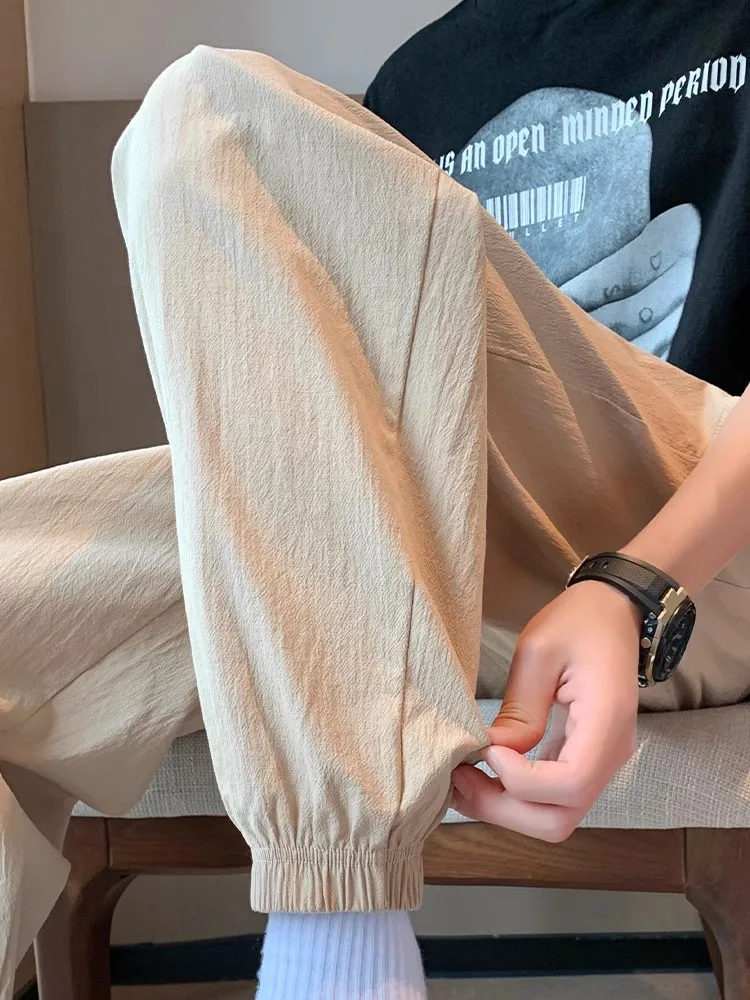 

Мужские летние тонкие свободные брюки из хлопка и льна с девятью точками, повседневные спортивные брюки, дышащие, легкие, удобные, прямые футболки...