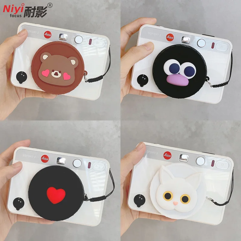 Capuchon d'objectif en silicone de dessin animé, anti-poussière, anti-perte avec cordon anti-perte pour objectif d'appareil photo Leica SOFORT 2 Sony ZV-E10 A6400 16-50mm Capuchon d'objectif en silicone de dessin animé, anti-poussière, anti-perte avec cordon anti-perte pour objectif d'appareil photo Leica SOFORT 2 Sony ZV-E10 A6400 16-50mm
