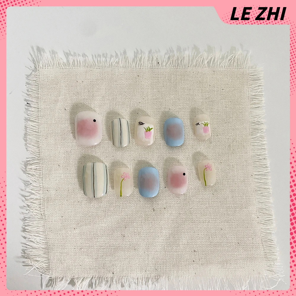 لطيف قصيرة الأظافر كاذبة الوردي الكرز القوس الجناح ندفة الثلج القوس تصميم رسمت باليد الزهور اللؤلؤ الحيوانات الأظافر كاذبة مخصصة